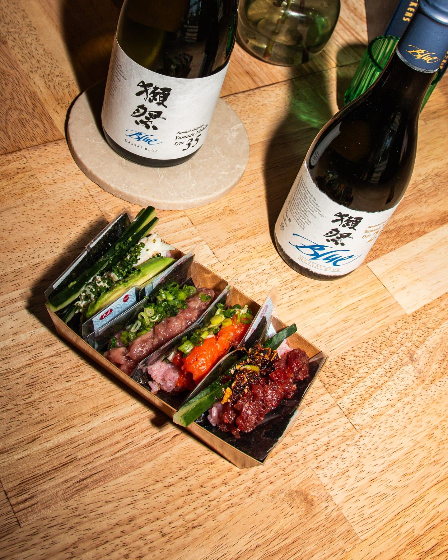 A spread of fresh handrolls and crudo at Kitsu Nori